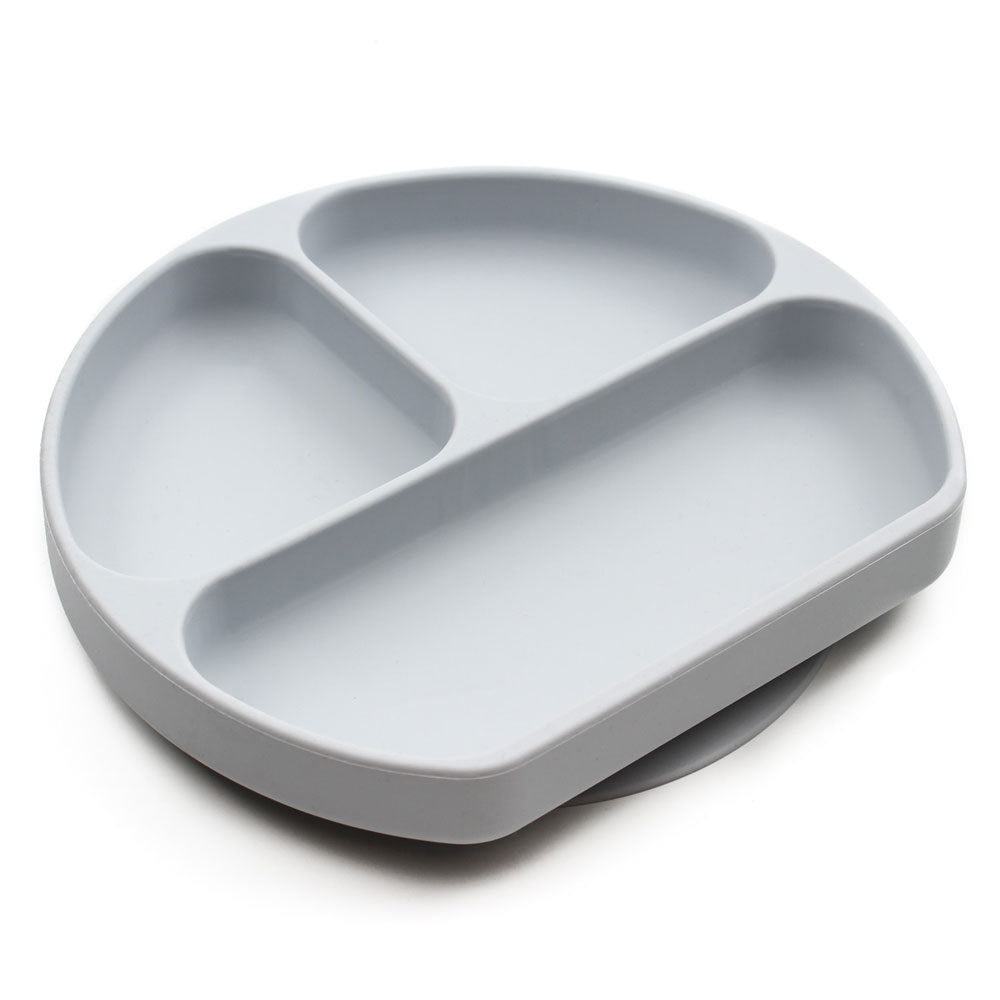 A grey bumkins silicone plate with three sections on a white background