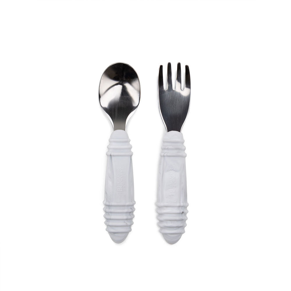Stainless steel spoon and fork with marble silicone handles on a white background