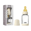 cream latex and glass anti colic baby bottle