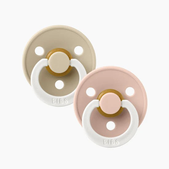 Beige and pink glow in the dark rubber pacifier two pack