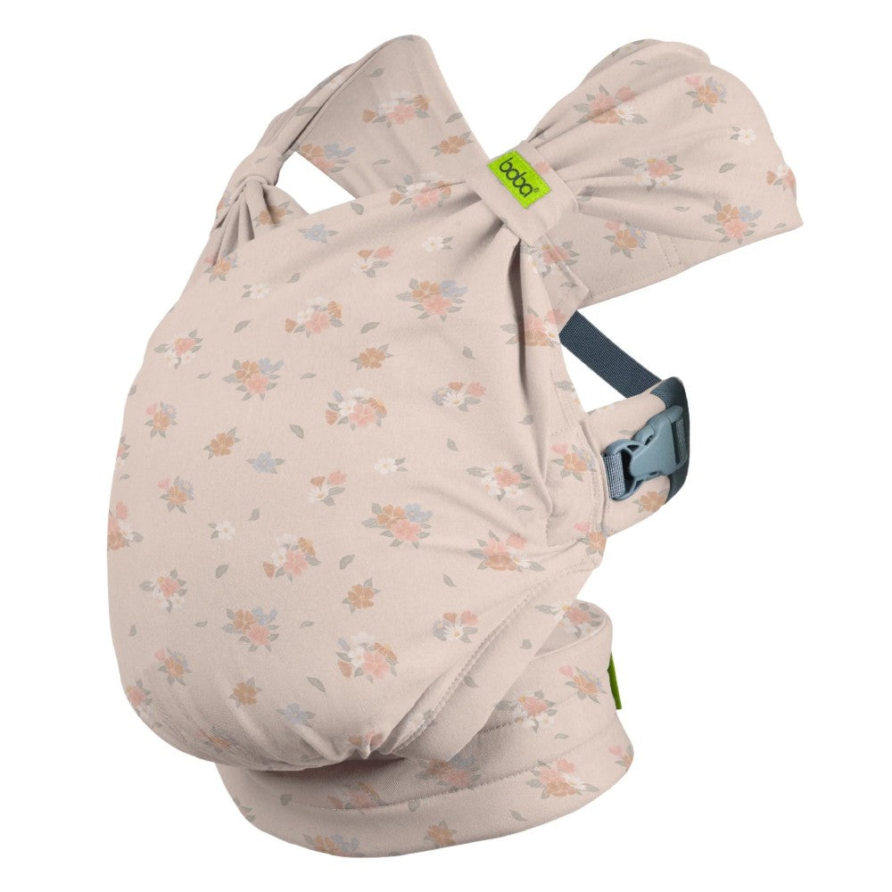 Floral-patterned Boba Bliss baby carrier on a white background