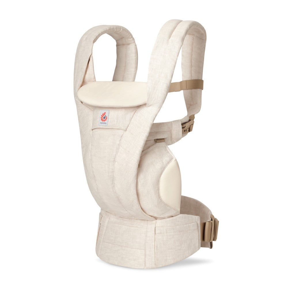 Beige baby carrier with a visible brand logo on a white background