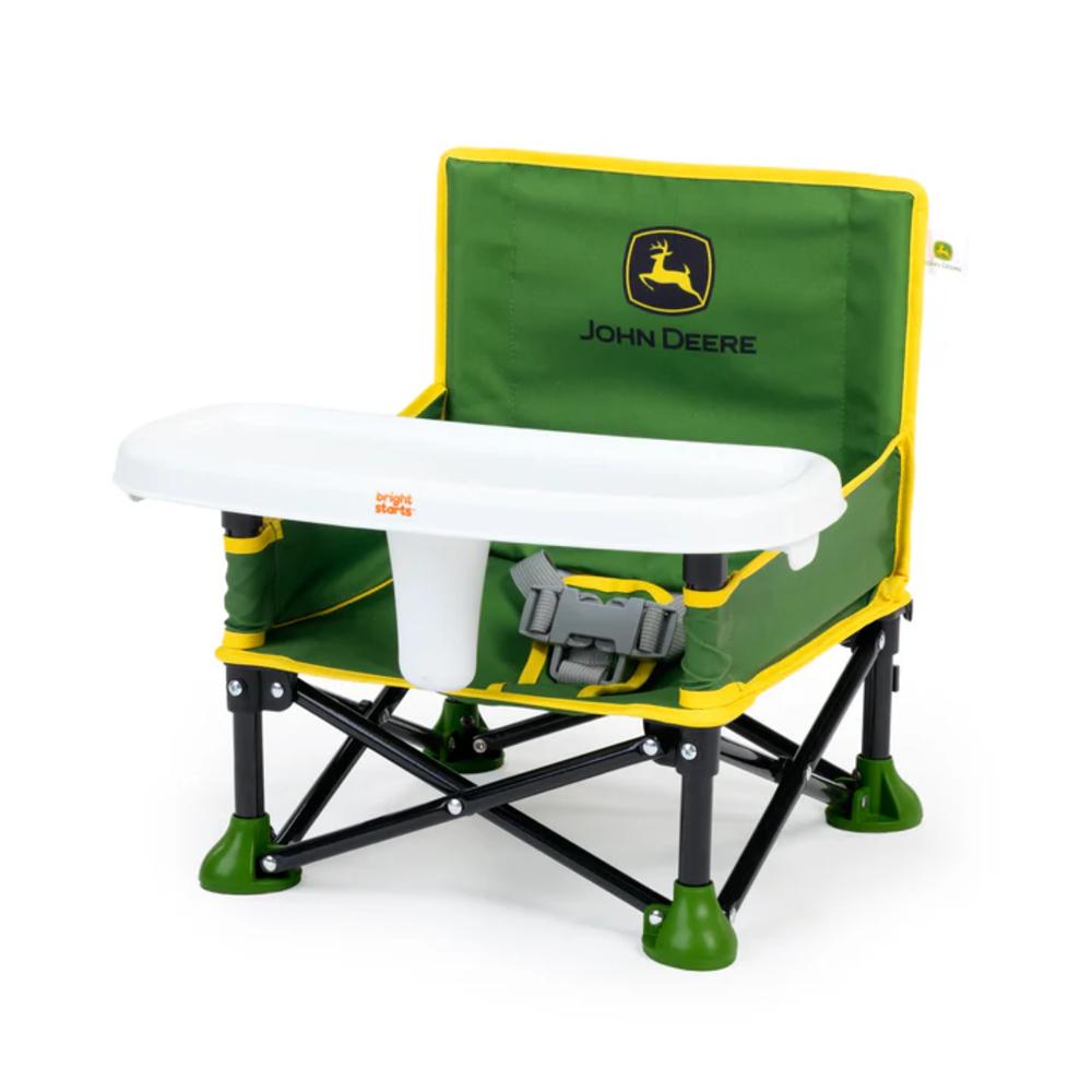 John Deere folding chair with a white tray on a white background