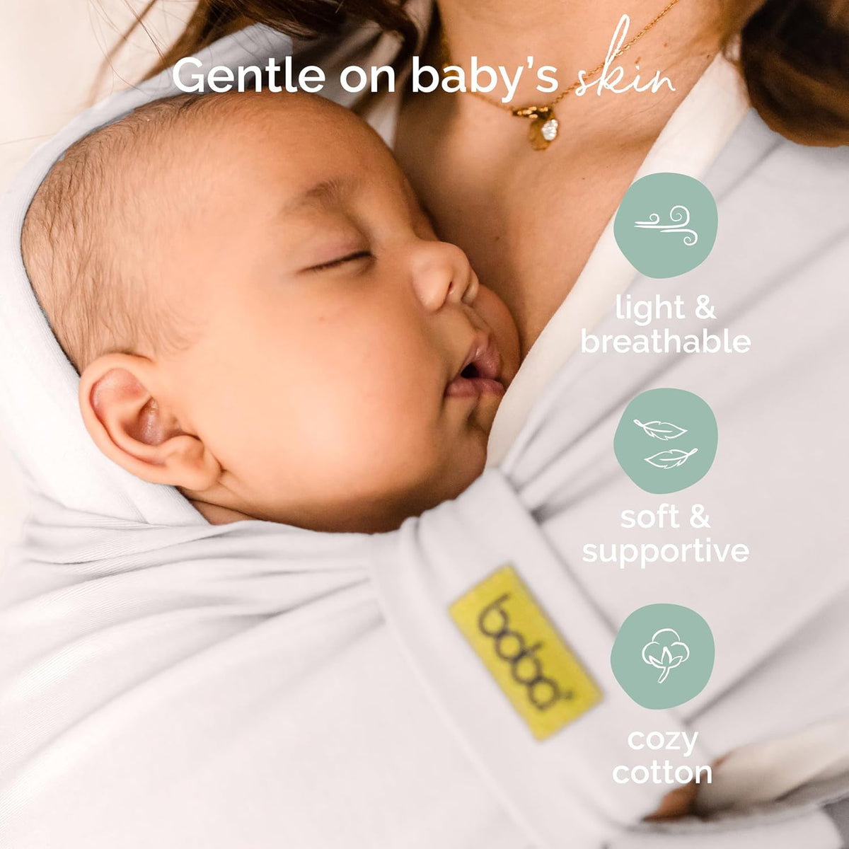 Boba Bliss gentle on skin, shown with Baby wrapped in a soft wrap with text highlighting its features