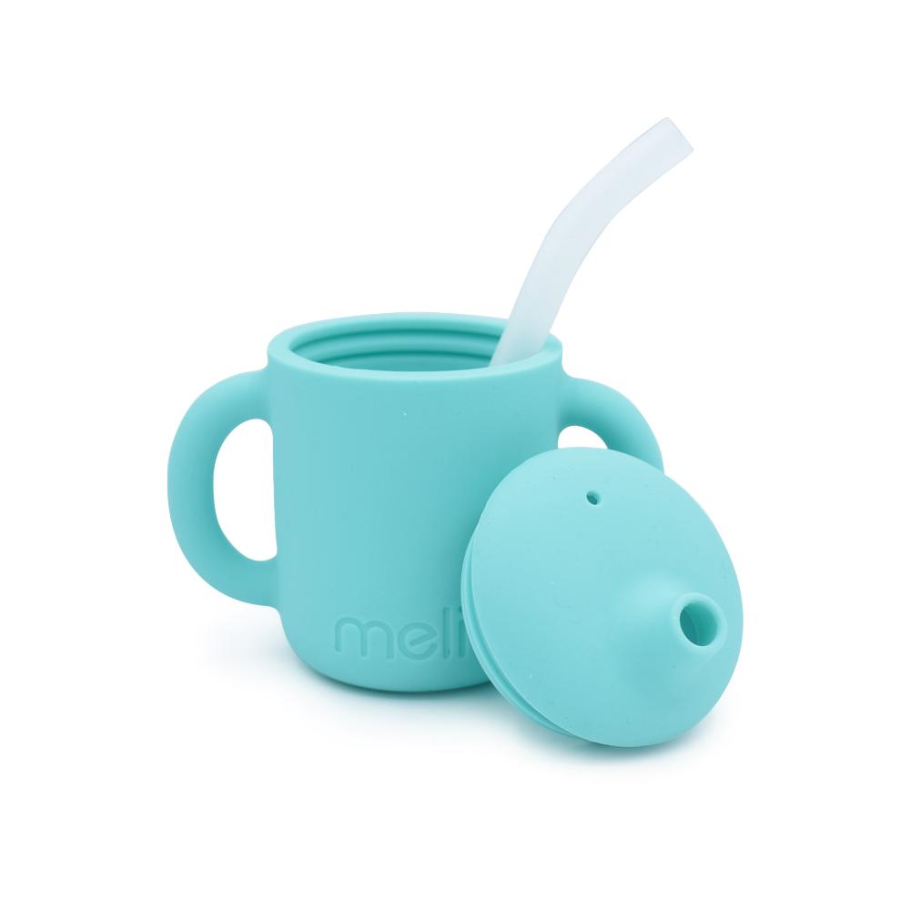 Blue Melii silicone cup with handle and straw on a white background