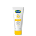 White Cetaphil sunscreen bottle against white background.