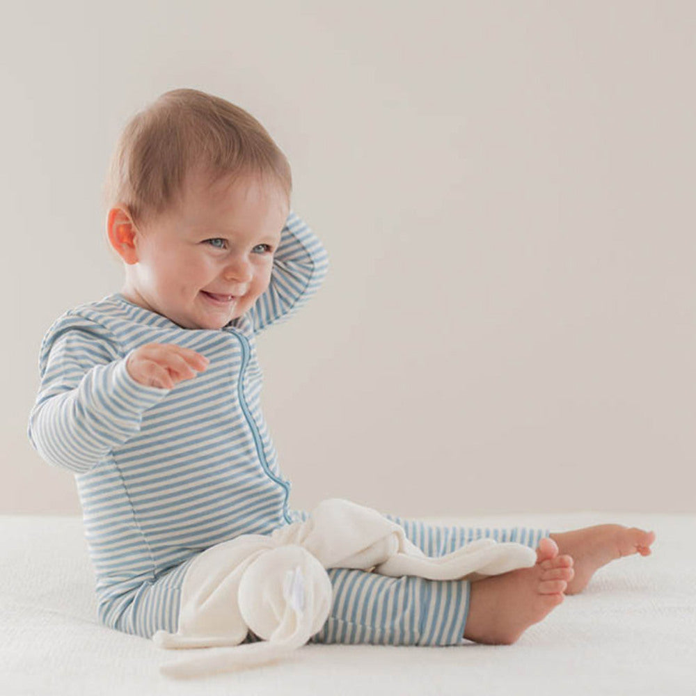 Child with Cuskiboo comforter
