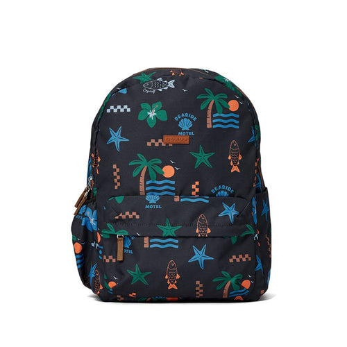 A black backpack with a colorful tropical beach print featuring palm trees, starfish, waves, and the words 'Seaside Motel'.