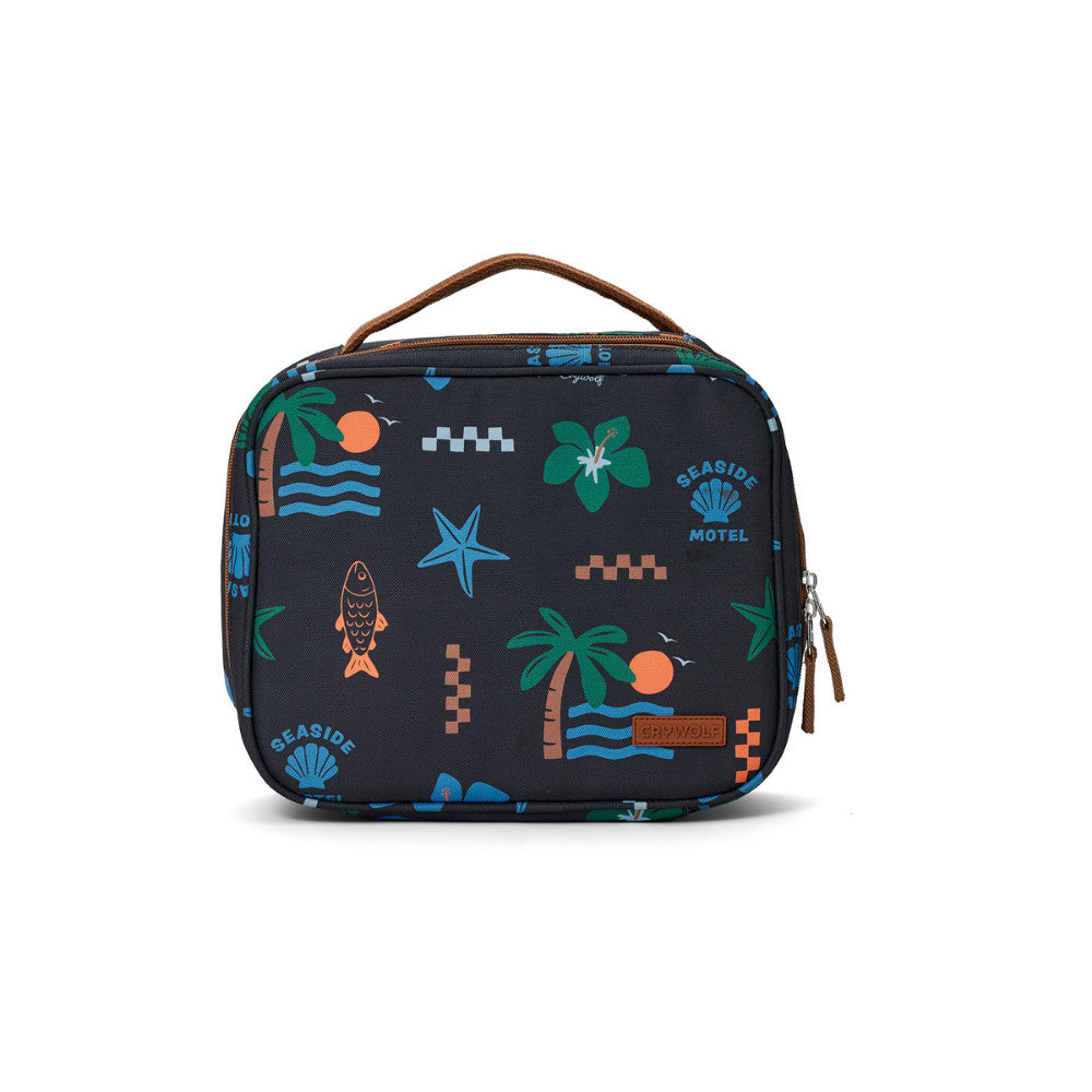 A rectangular zippered lunch bag with a top handle, featuring a black background with a tropical seaside print including palm trees, starfish, waves, and the words 'Seaside Motel'.