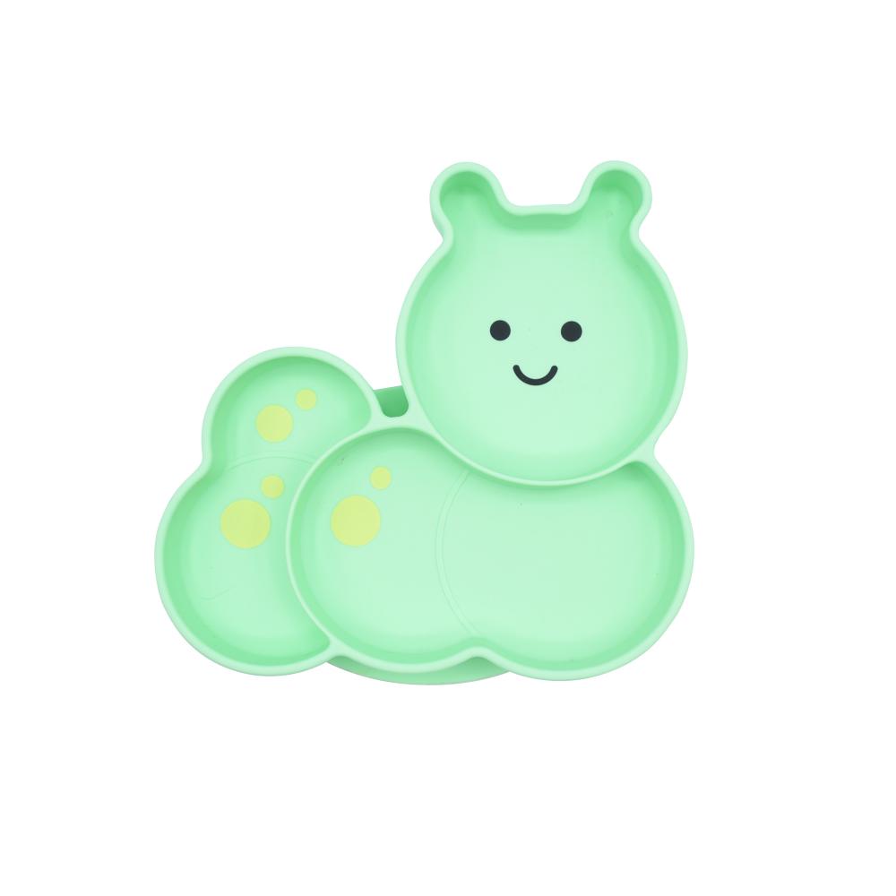 Green caterpillar-shaped silicone divided plate with yellow spots on a white background