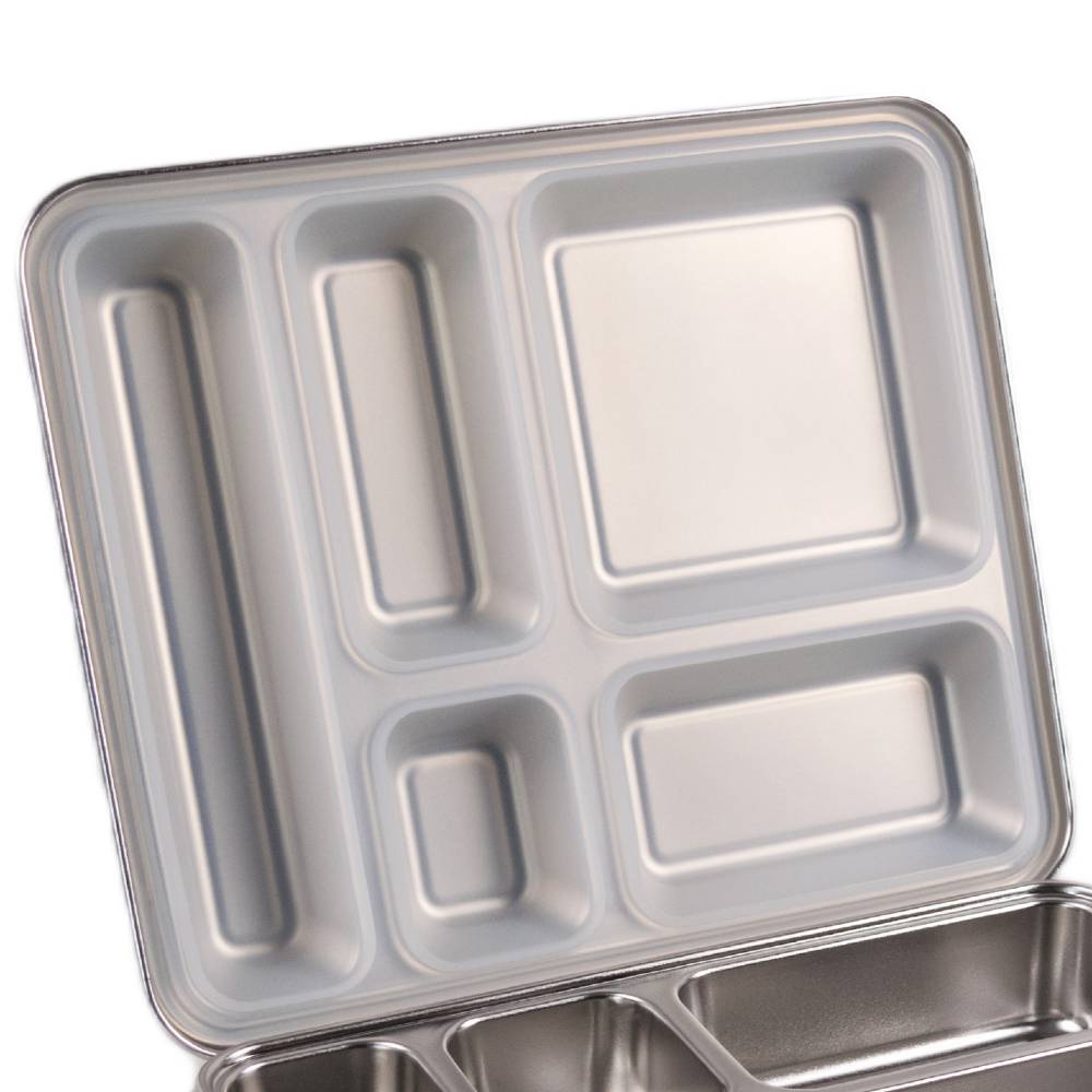 Inside of a lunchbox showing silicone seal on a white background