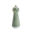 Green silicone dinosaur torch nightlight toy with a smiling face on a white background