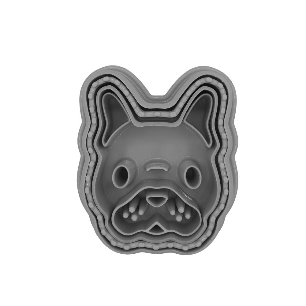 Set of bulldog-shaped cookie cutters on a white background