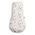 White baby sleeping bag with bunnies on a white background