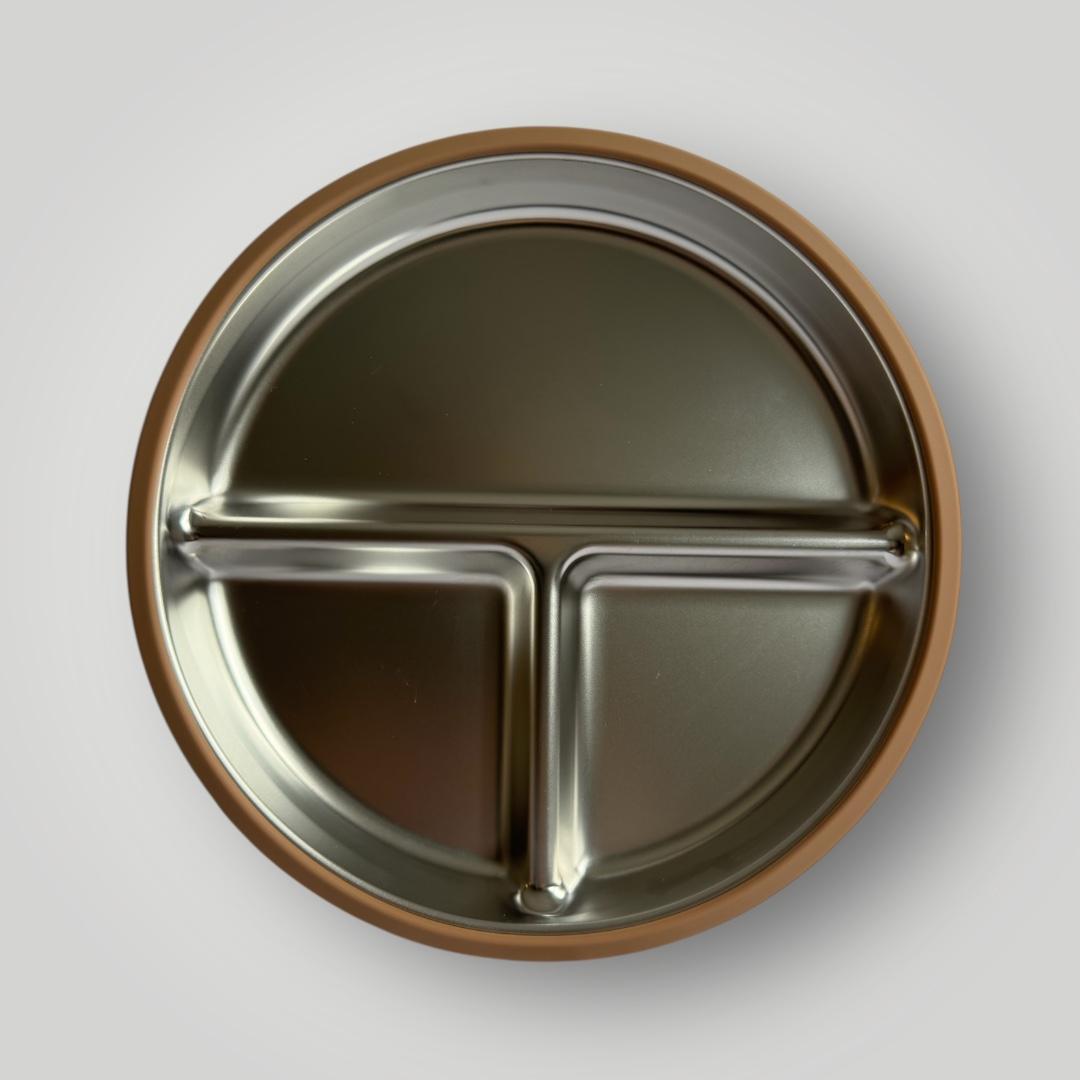 A round stainless steel divided lunch plate with three compartments and a brown rim, shown from a top-down perspective on a light gray background.