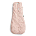 Pink baby sleeping bag with subtle pattern on a white background