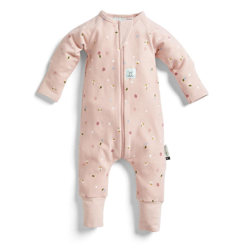 Pink baby onesie with floral patterns on a white background