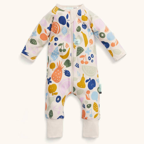 Colorful baby onesie with fruit pattern on a white background