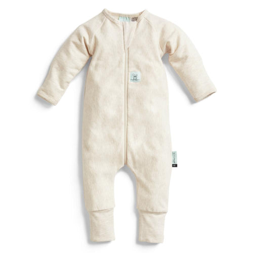 Beige baby onesie with a zipper on a white background