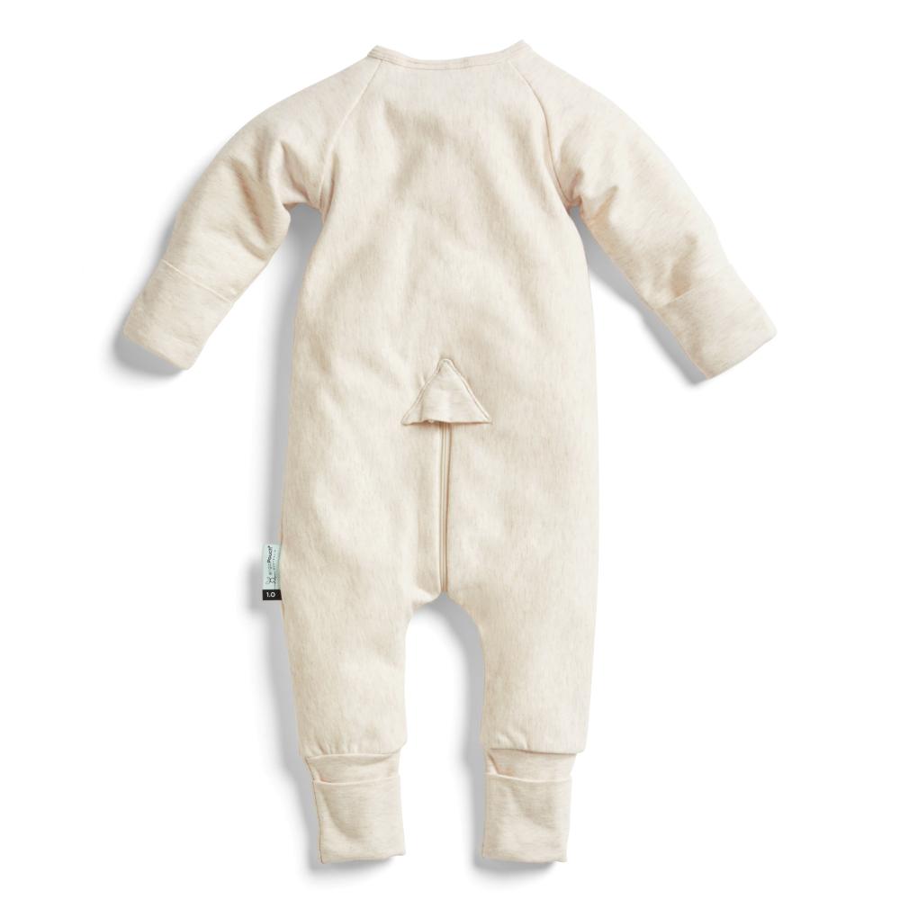 Beige baby onesie on a white background
