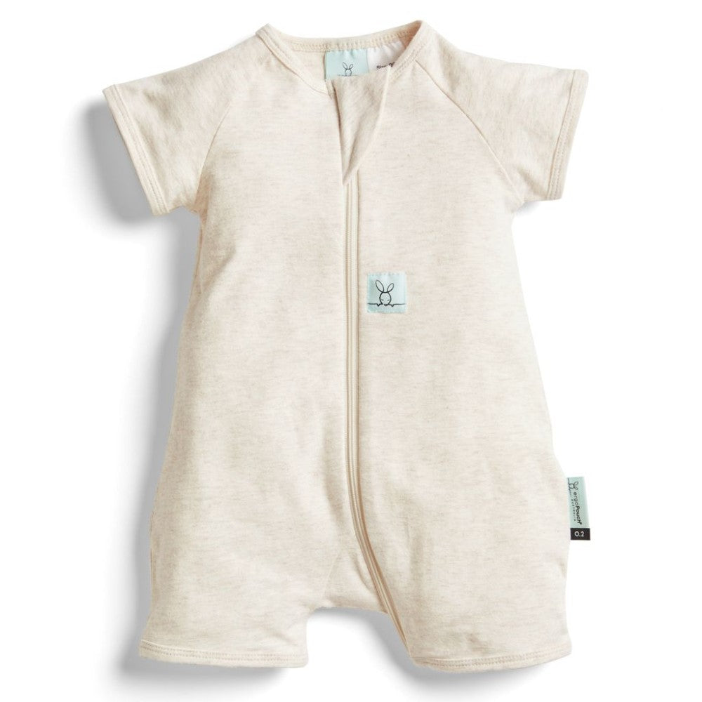 Beige baby short-sleeve onesie with a small logo on a white background