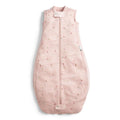Pink baby sleeping bag with star pattern on a white background