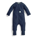 Navy blue baby onesie with a small logo on a white background