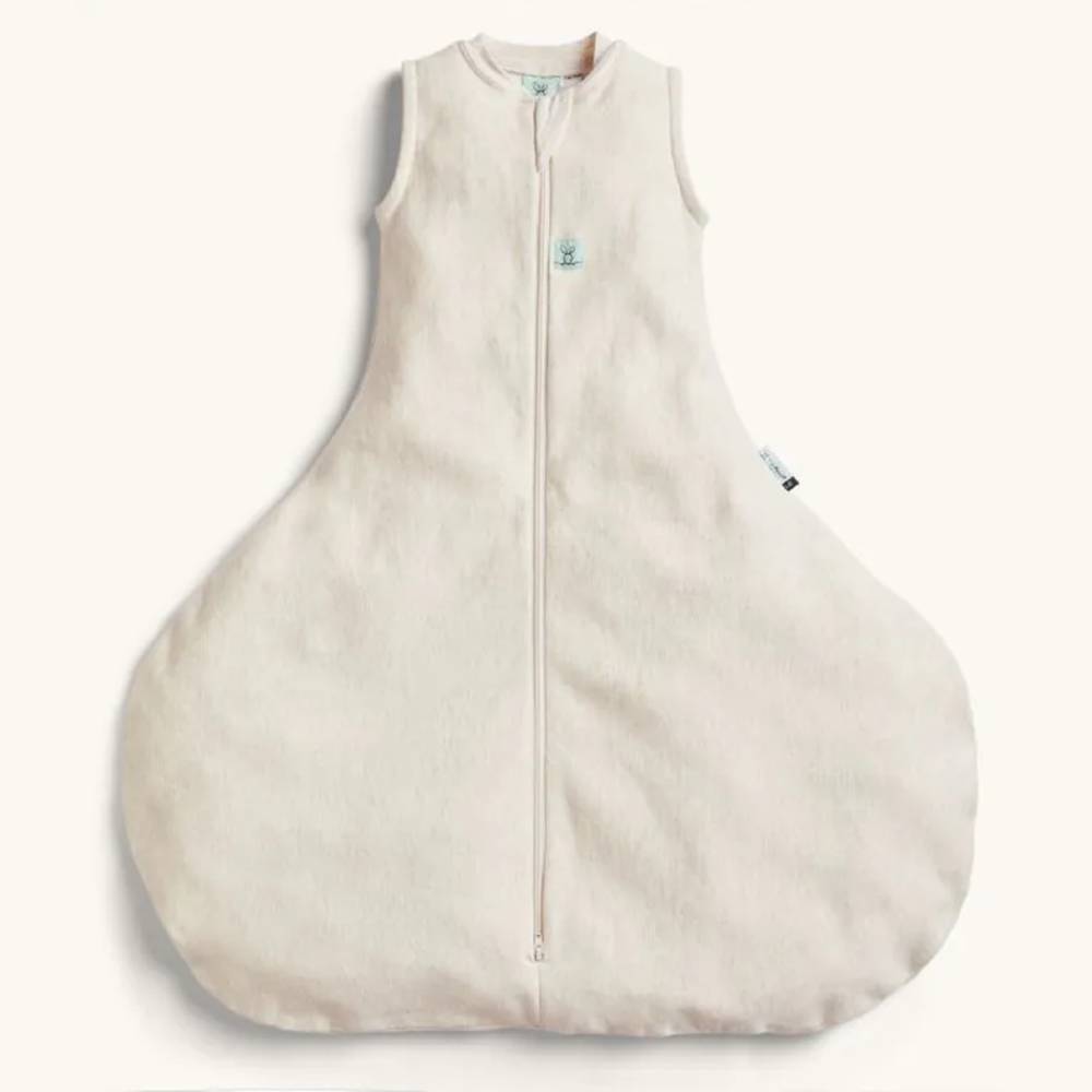 Beige hip dysplasia baby sleeping bag with a zipper on a white background
