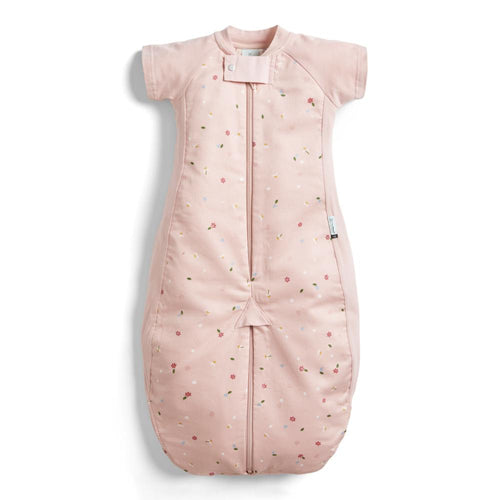 Pink baby sleeping bag with floral pattern on a white background