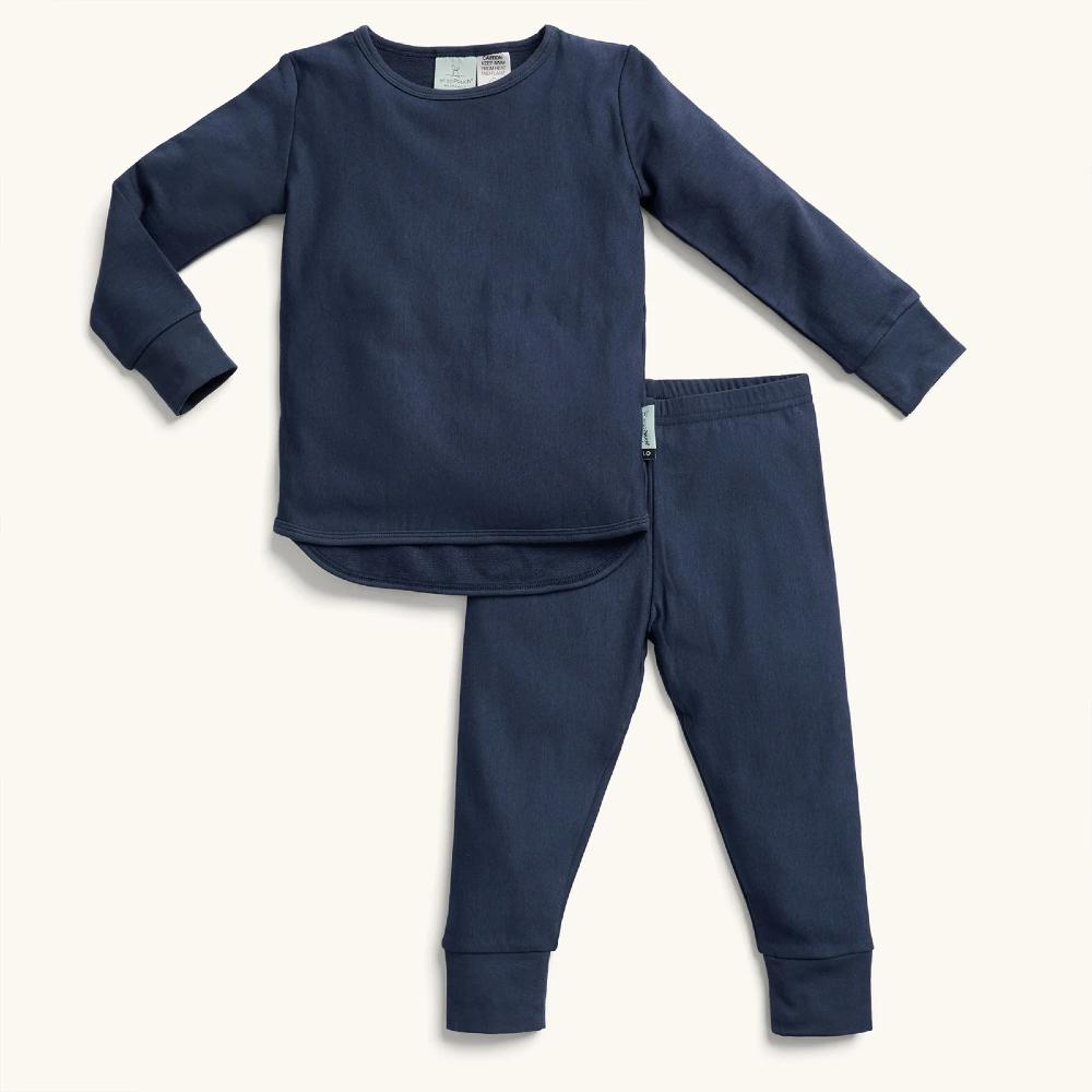 Navy blue pajama set with long-sleeve top and pants on a white background