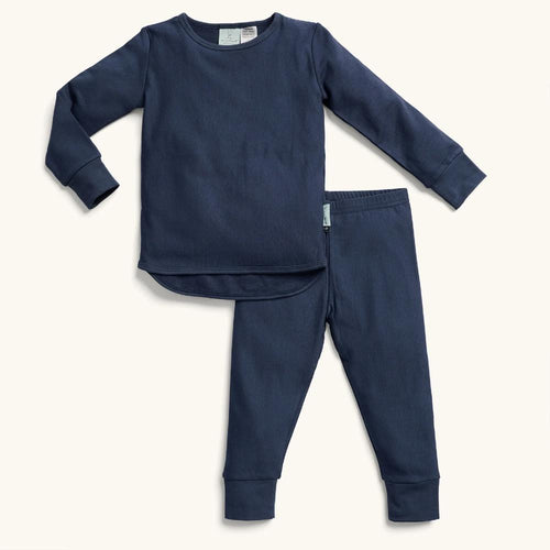 Navy blue pajama set with long-sleeve top and pants on a white background