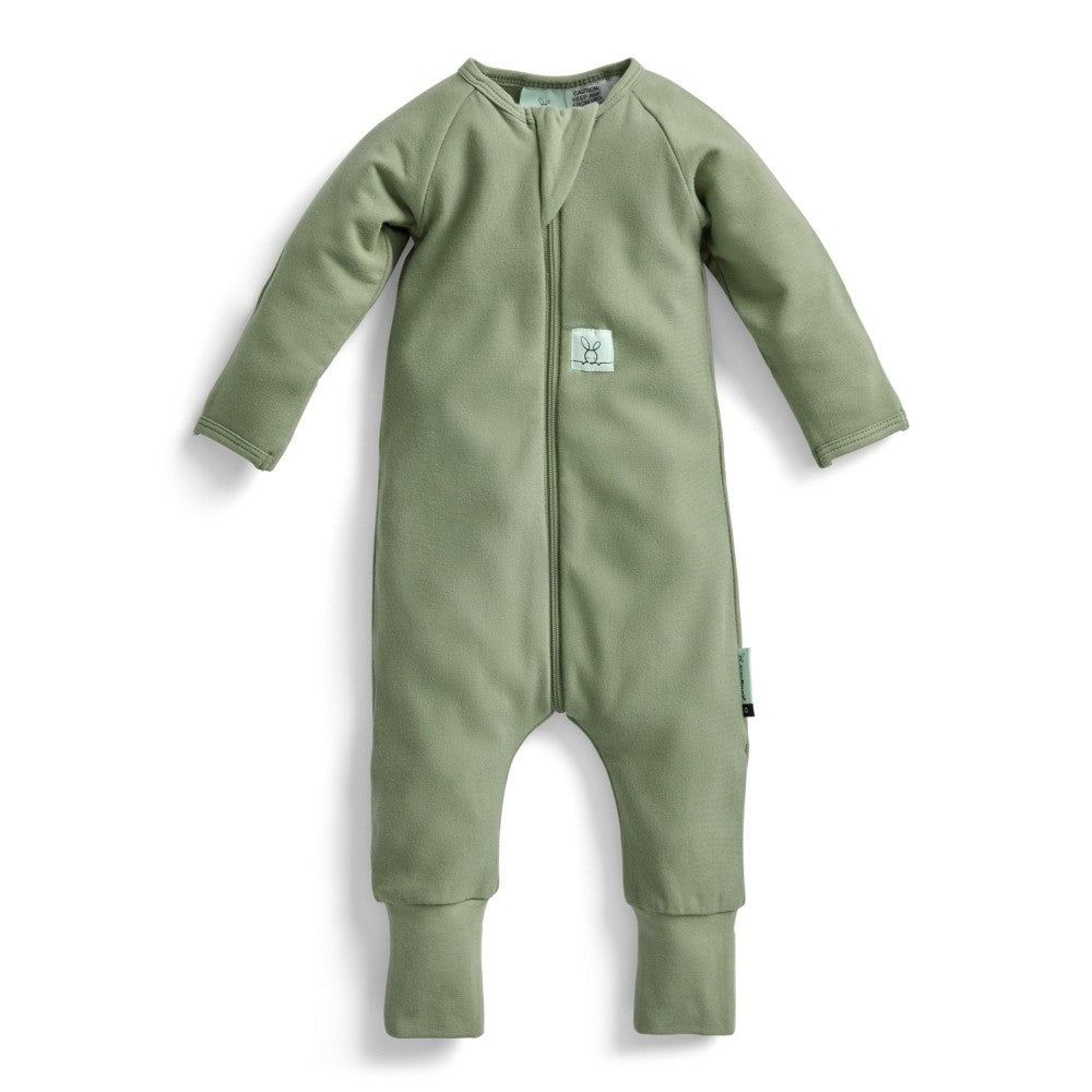 Green baby onesie with a zipper on a white background