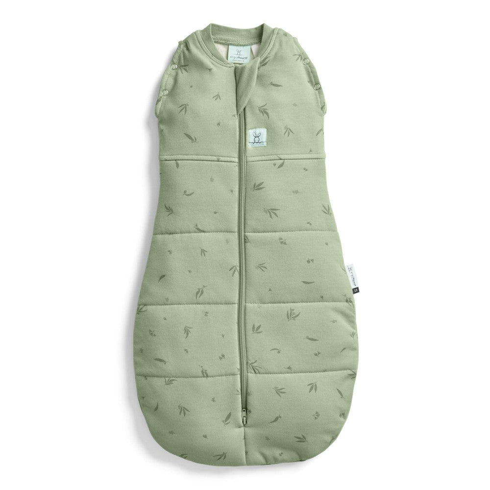 Green baby sleeping bag with leaf pattern on a white background