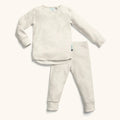Children's beige pajama set on a white background