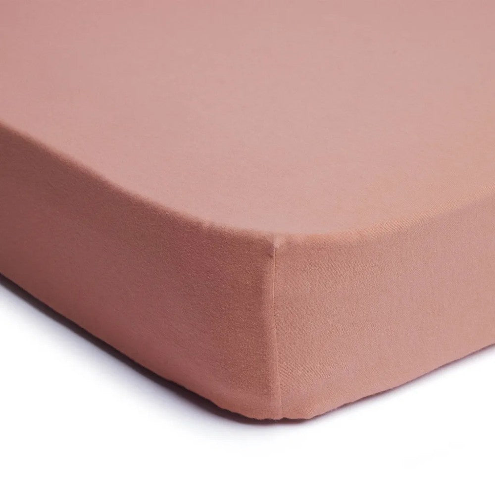 Fitted Sheet - Rose on a mattress on a white background