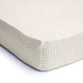 Fitted Sheet - Caramel Grid on a mattress on a white background