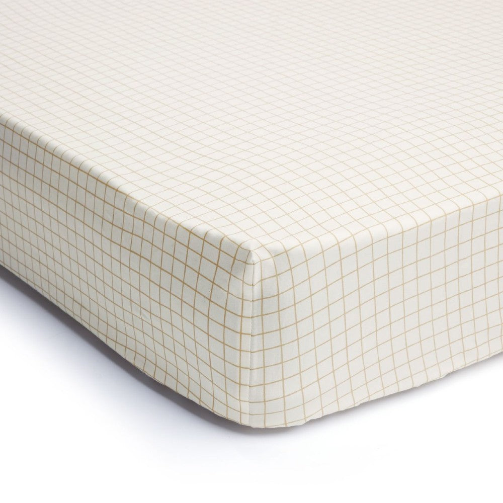 Fitted Sheet - Caramel Grid on a mattress on a white background