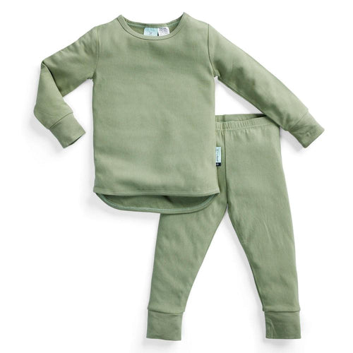 Green children's pajama set on a white background