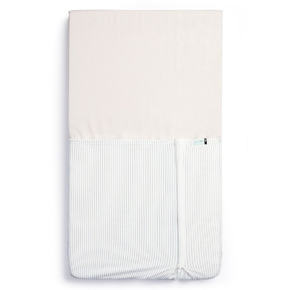 HugMe Blanket in Midnight Stripe pattern on a mattress on white background