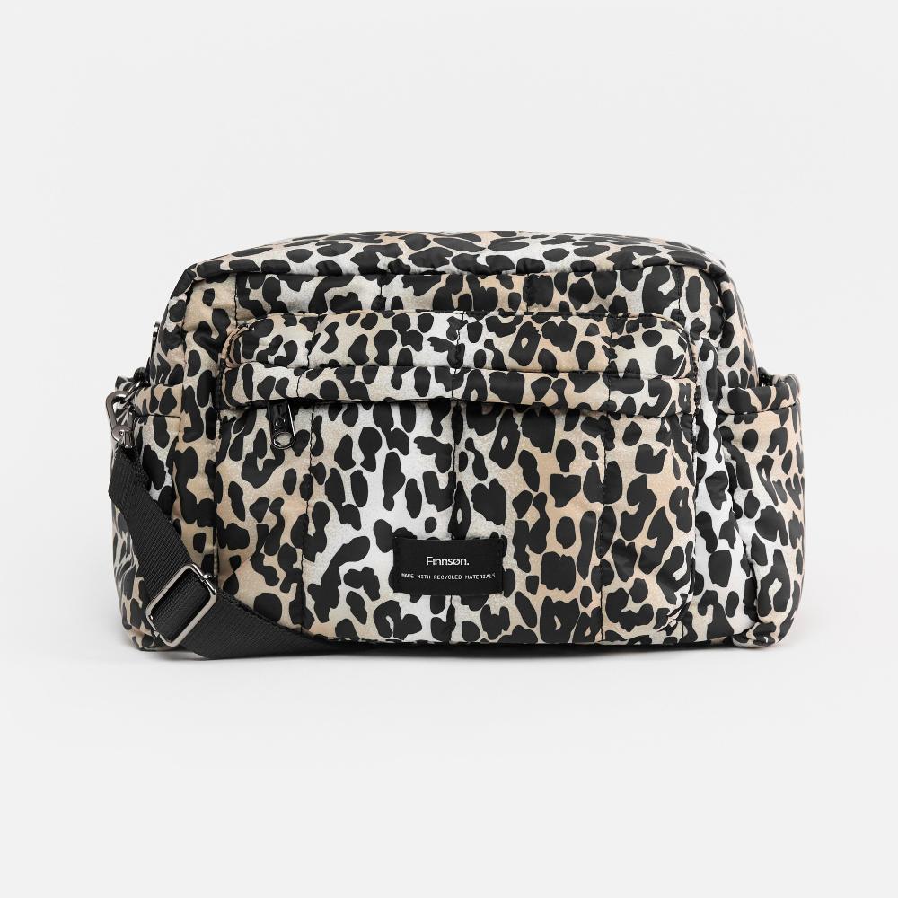 Leopard Print Nappy Bag with Finnson label on a white background