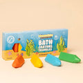 Honeysticks rainbow bath crayons against cream background.