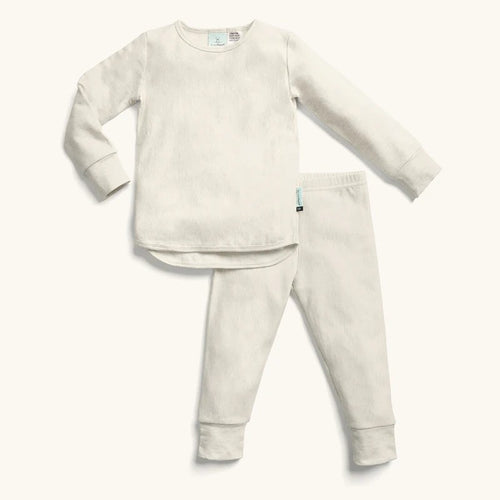 Children's beige pajama set on a white background