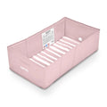 Pink portable tuckaway baby bath on a white background. 
