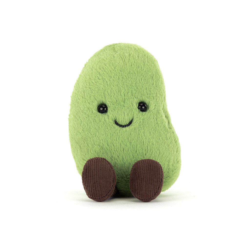 Green Jellycat bean soft toy with brown feet against white background.