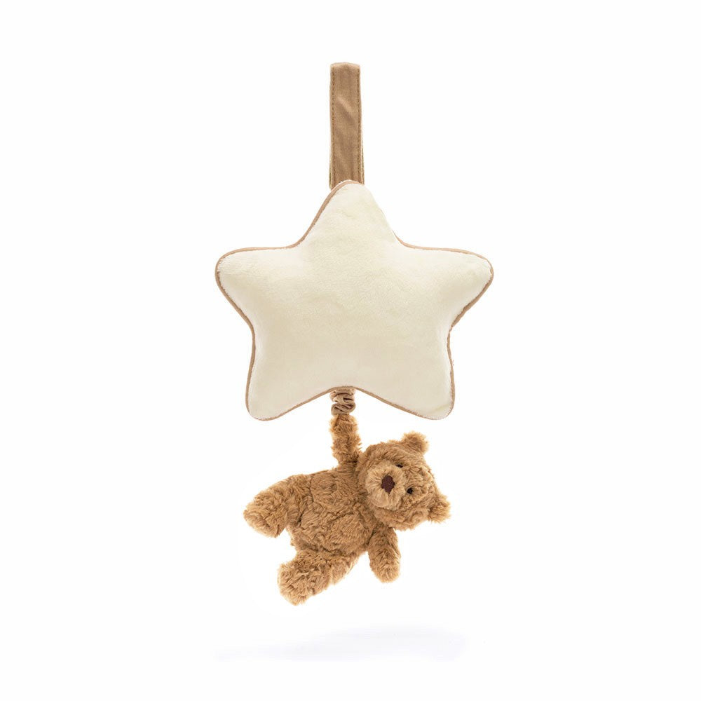Jellycat white star musical pull with small brown bear attached against white background.