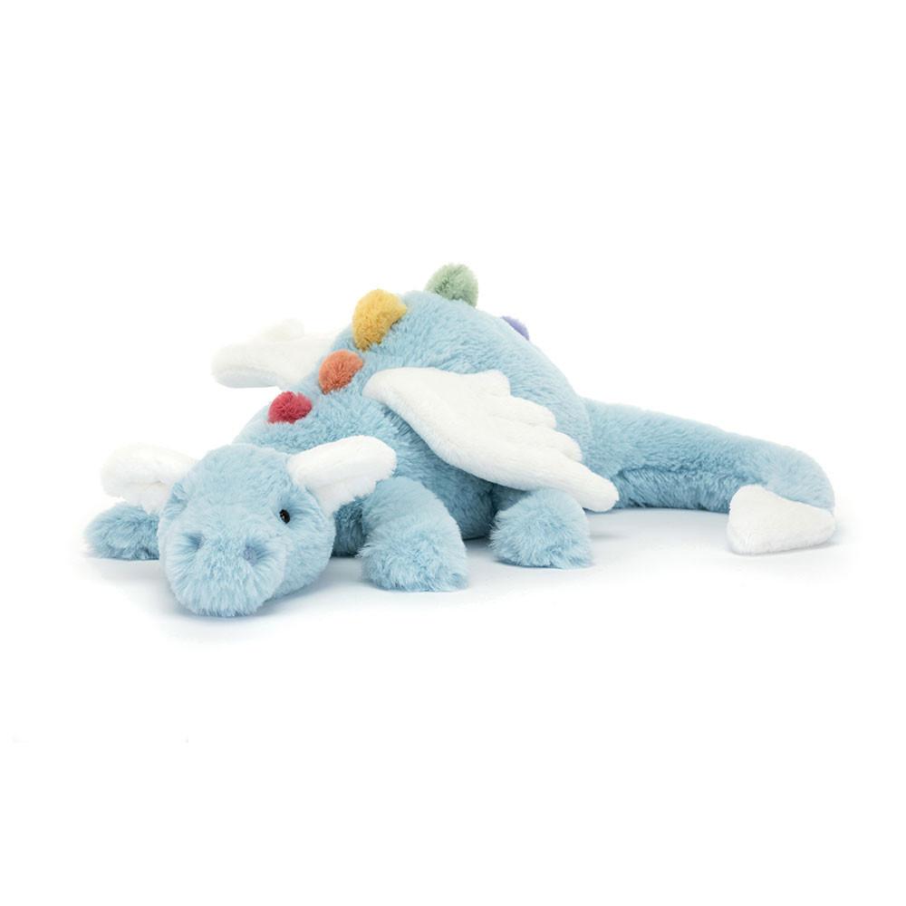 Jellycat blue dragon soft toy with rainbow spikes against white background.