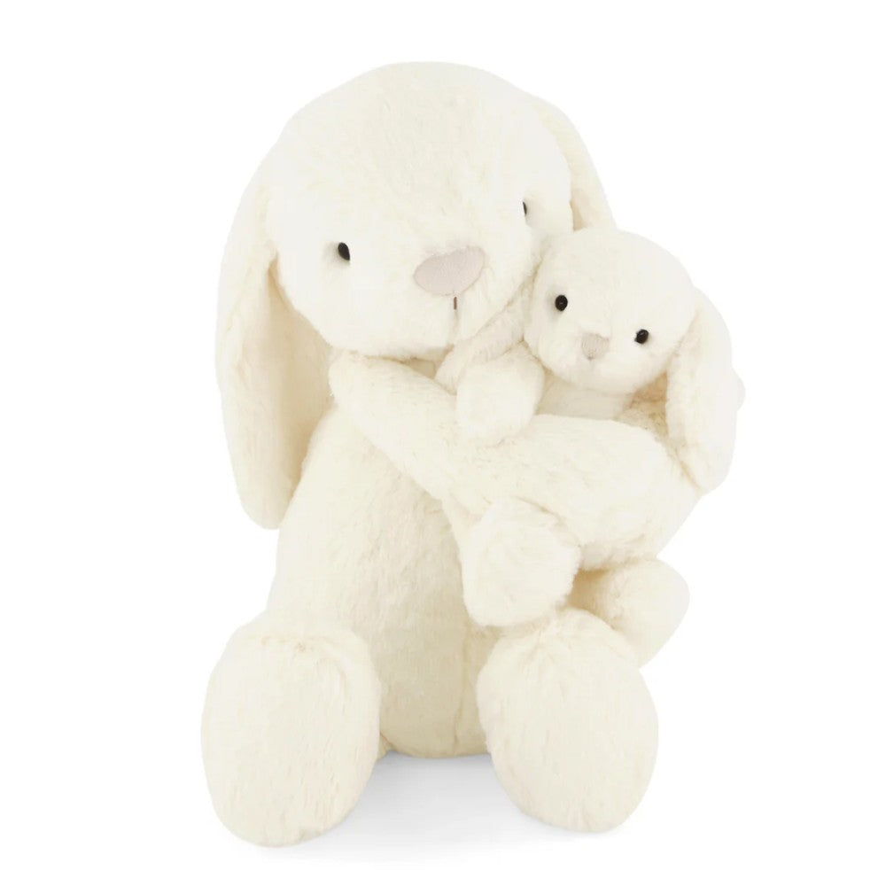 Cream Jamie Kay bunny soft toys against white background.