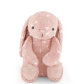Pink Jamie Kay bunny soft toy with white hearts against white background.