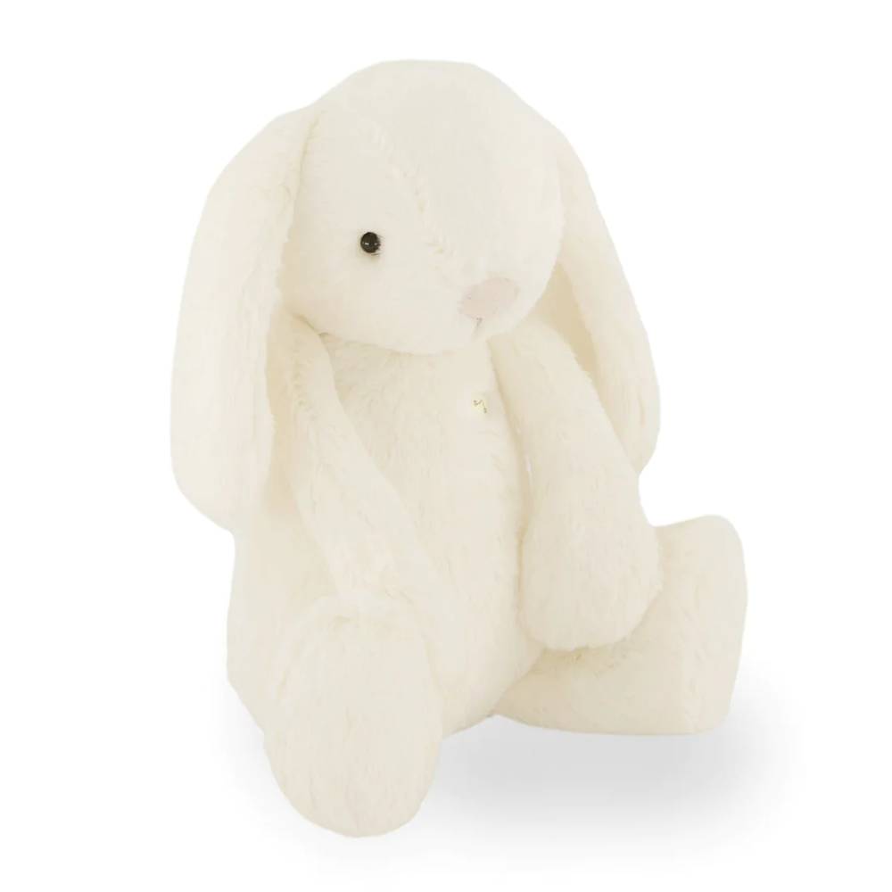 Cream Jamie Kay bunny soft toy against white background.