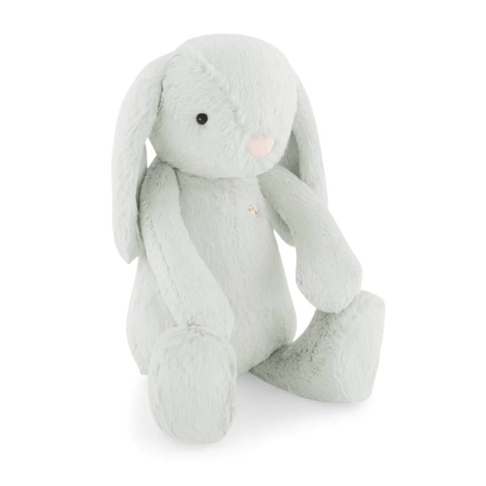 Light blue coloured Jamie Kay bunny soft toy against white background.